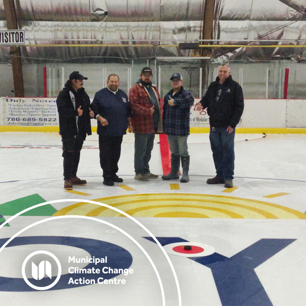 The installation team gives the thumbs-up to the new arena liner in Boyle.