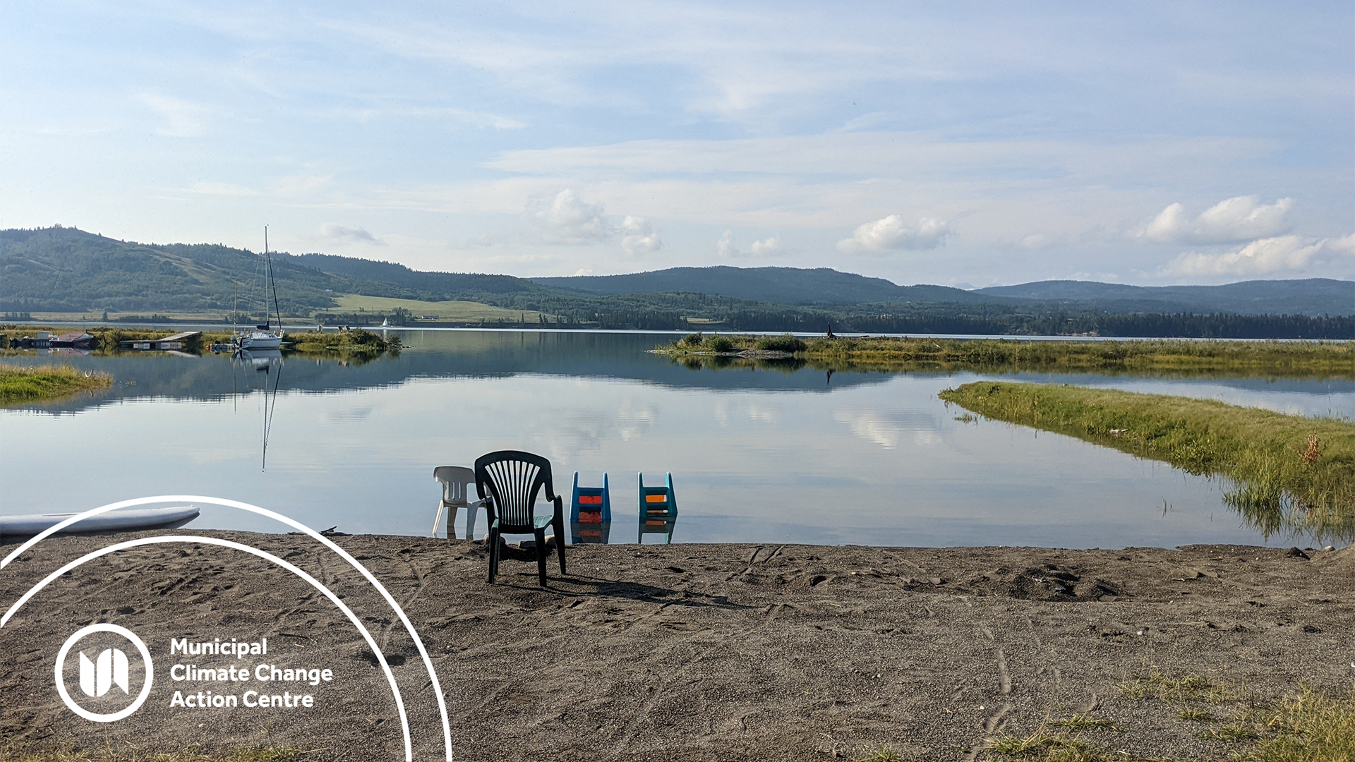 Empty chairs on a beach at Ghost Lake